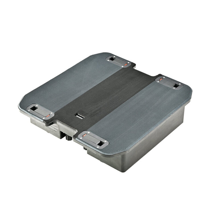 Rider Plus G3 Battery, a dark gray rectangular pack with a textured top and four latches on a white background.