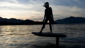 EFOIL Carbon Fiber Y1 premium electric hydrofoil board flying above water with advanced foil technology